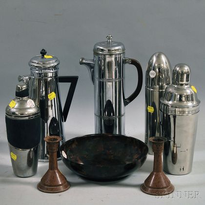Five Cocktail Shakers, a Bowl, and a Pair of Candlesticks