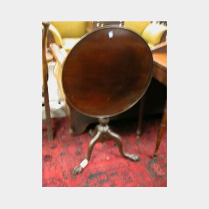 Chippendale-style Carved Mahogany Dish Tilt-top Candlestand. 