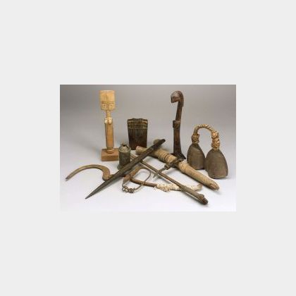 Eleven African Carved Wood or Metal Items
