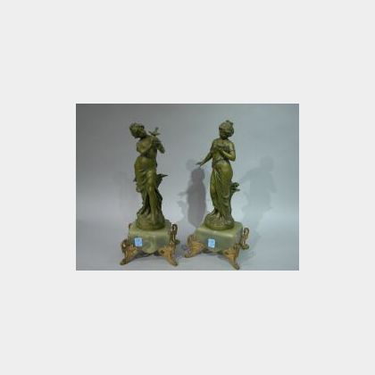 Pair of L. and F. Moreau Art Nouveau Patinated Metal Figures on Onyx and Gilt-metal Mounted Bases. 