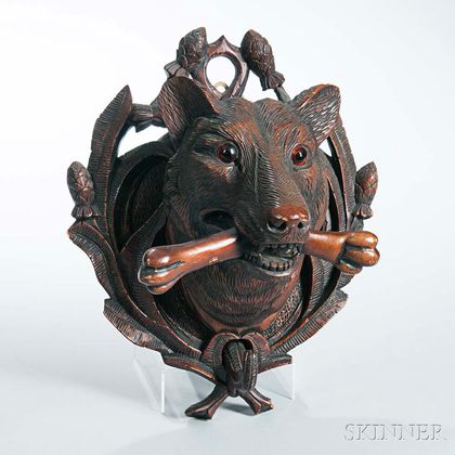 Small Black Forest Carved Plaque of a Dog with a Bone