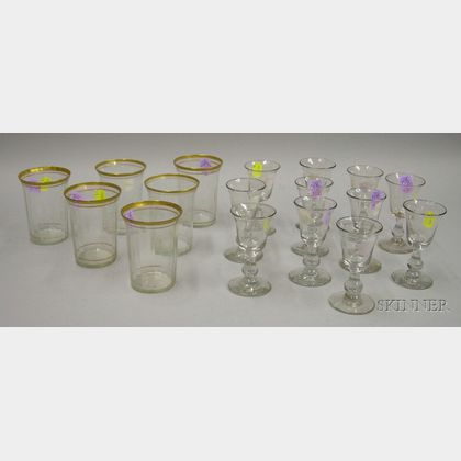 Set of Eleven Colorless Blown Glass Wines and a Set of Six Gilt Colorless Glass Tumblers. 