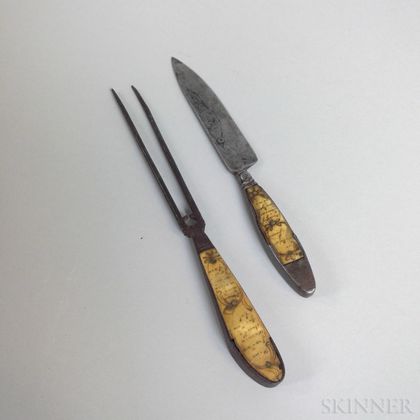 Continental Engraved Bone and Iron Fork and Knife. Estimate $150-250