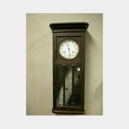 Ansonia Classical Revival Mahogany Veneer Wall Clock with Beveled Glass. 