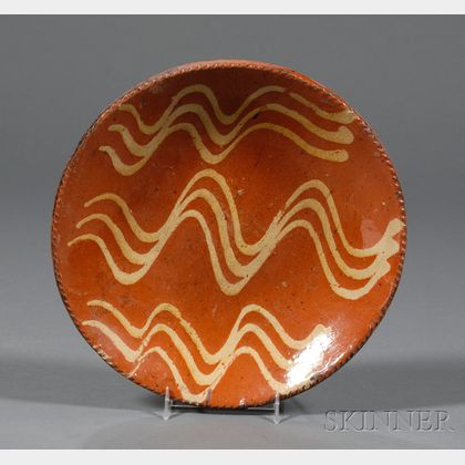 Redware Plate with Yellow Slip Wavy Line Decoration