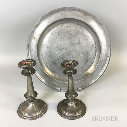English Pewter Charger and a Pair of Weighted Candlesticks