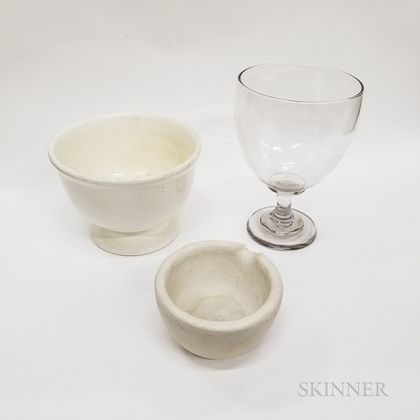 Blown Colorless Glass Compote, a White Footed Bowl, and a Stone Mortar
