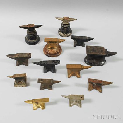 Thirteen Cast Iron and Brass Jeweler's Anvils
