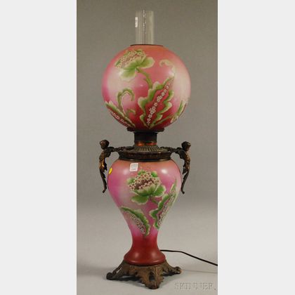 Late Victorian Figural Cast Metal-mounted, Painted, and Floral-decorated Opaque Glass Gone-with-the-Wind Kerosene Table Lamp