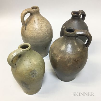 Four Small Stoneware Handled Jugs