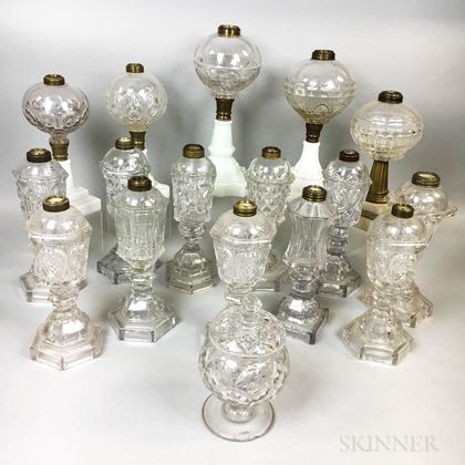 Sixteen Sandwich Colorless Glass Fluid Lamps and a Covered Bonbon Dish