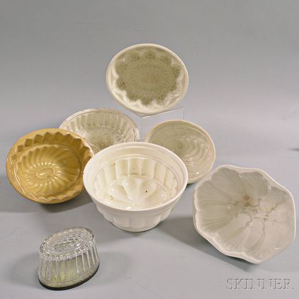 Seven Mostly Ceramic Food Molds