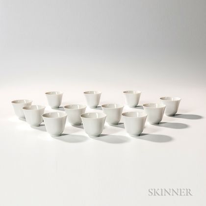 Set of Twelve White Porcelain Wine Cups