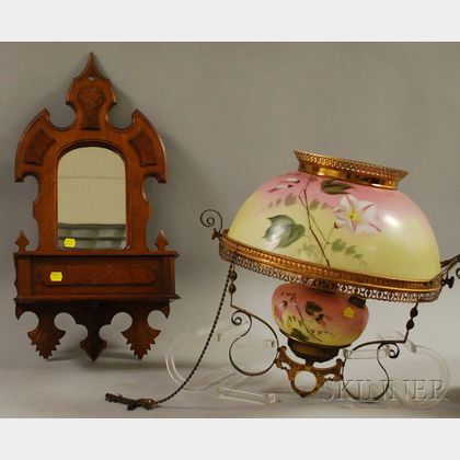Late Victorian Painted Opaque Glass and Gilt-metal Hanging Kerosene Lamp and a Carved Walnut Hall Mirror