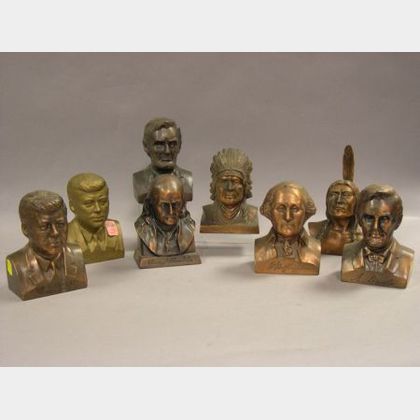 Eight Cast Metal Bust Banks
