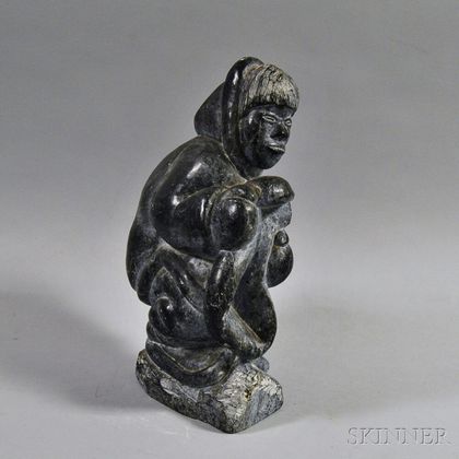 Inuit Soapstone Carving of a Man Wearing a Parka