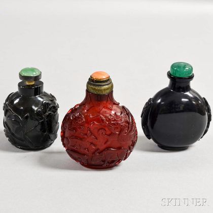 Three Carved Glass Snuff Bottles