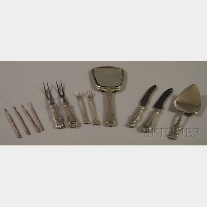 Twelve Assorted Sterling Silver, Silver-plated, and Silver-handled Flatware and Vanity Items