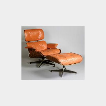 Charles and Ray Eames Rosewood and Leather Armchair and Ottoman