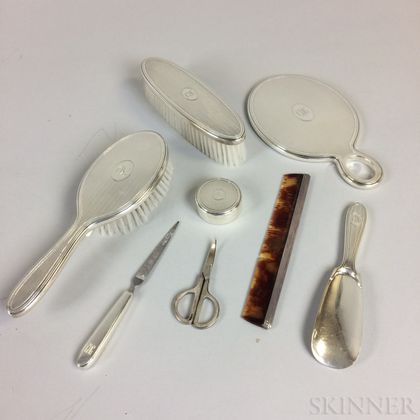 Assembled Eight-piece Tiffany & Co. Sterling Silver Vanity Set. Estimate $200-400