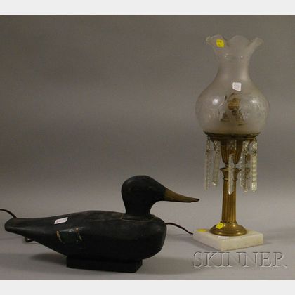 Brass Sinumbra Lamp with Prisms and Frosted Glass Shade and a Painted Carved Wooden Duck Decoy. 