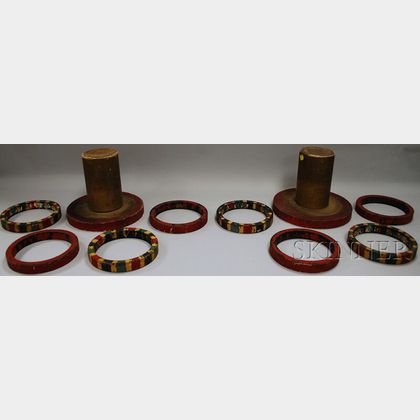 Pair of Polychrome-painted Wood, Composition, and Rubber Carnival Ring Toss Games