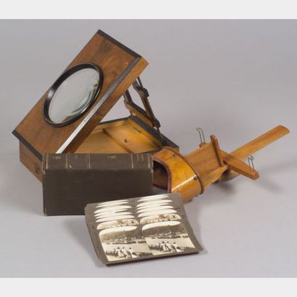Two Viewers and a Partial Set of Underwood Stereoscopic Cards