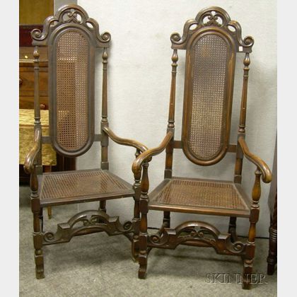 Pair of Paine Furniture Jacobean-style Caned Carved Beechwood Armchairs. 