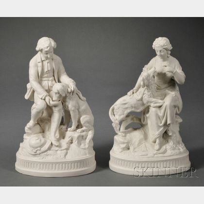 Pair of Parian Figures of a Young Man and Woman with Dogs