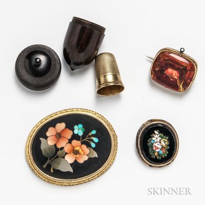 Three Brooches and a Thimble in an Acorn Case