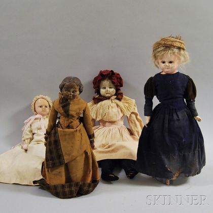 Four Papier-mache Dolls