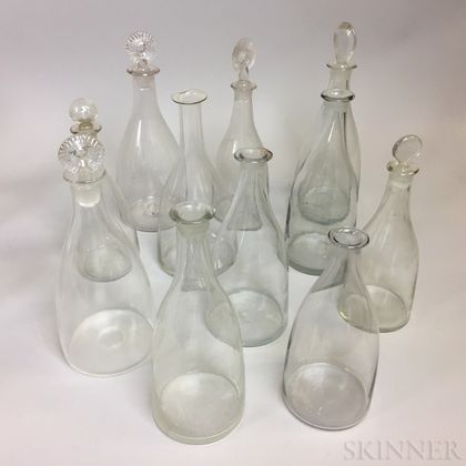Eleven Blown Colorless Glass Decanters