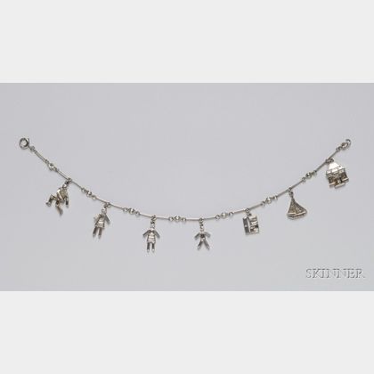 Sold at auction Art Deco Platinum and Diamond Charm Bracelet