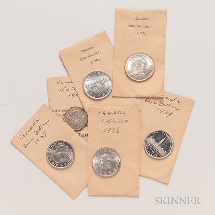 Five Uncirculated 1935-39 Canadian Dollars and a 1945 50 Cent. Estimate $200-400