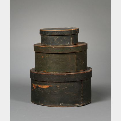 Three Painted Round Wooden Lap-sided Boxes with Covers
