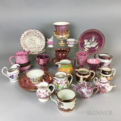 Twenty-five Pink Lustre Ceramic Tableware Items. Estimate $20-200