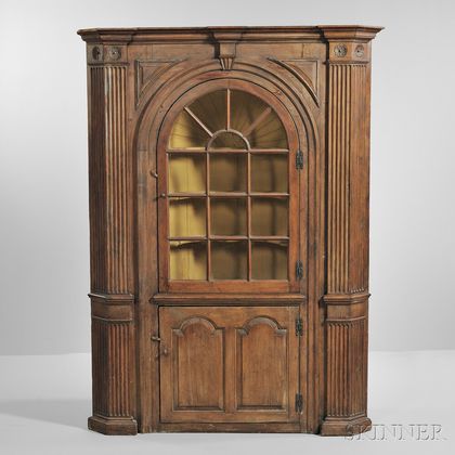 Glazed Carved Pine Barrel-back Corner Cupboard