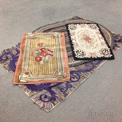 Three Floral Hooked Rugs and a Braided Rug