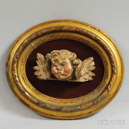 Carved Wood and Gesso Plaque of a Putto Head