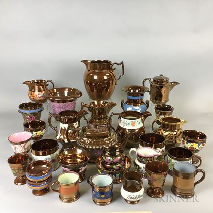 Thirty-two Copper Lustre Ceramic Vessels. Estimate $20-200