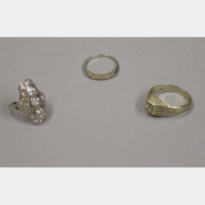 14kt White Gold Art Deco Three Stone Diamond Ring, a 14kt Gold and Diamond Ring, and a Diamond Band. 