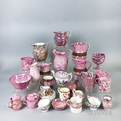 Thirty-five Pink Lustre Ceramic Tableware Items. Estimate $20-200