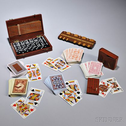 Group of Gaming Items, England or America, late 19th/early 20th century, including a marker board, a leather-cased set of dominos with 