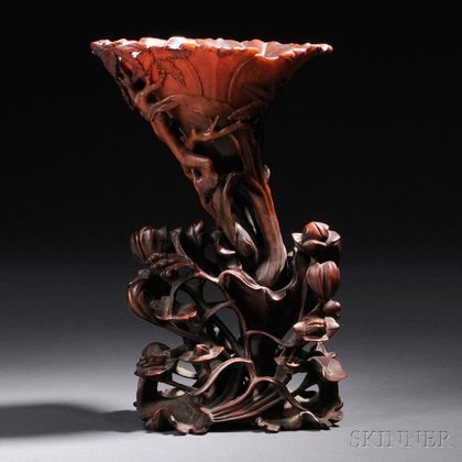 Rhinoceros Horn "Lily" Cup and Carved Wood Stand