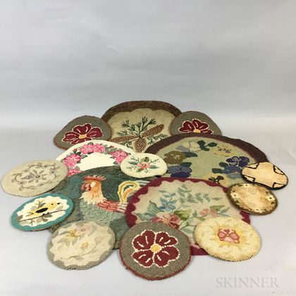 Fourteen Small Round Hooked Mats. Estimate $150-250