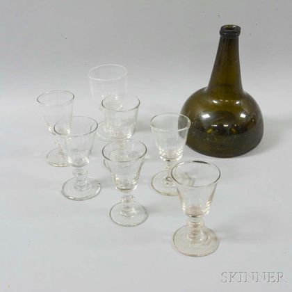Early Olive Onion Bottle and Six Colorless Blown Glass Cordials and a Wine