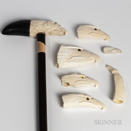 Four Carved Whale Ivory Eagle Heads, an Ivory Eagle Head Cane, and Two Other Items