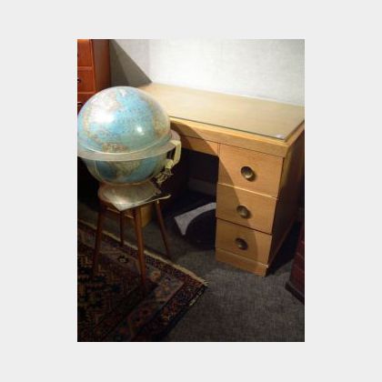Moderne Cypress Flat-top Double Pedestal Desk and a 1963 National Geographic Society Illuminated World Globe on Stand. 