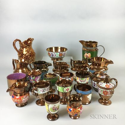 Twenty-two Pieces of Copper Lustre Ceramic Tableware. Estimate $20-200