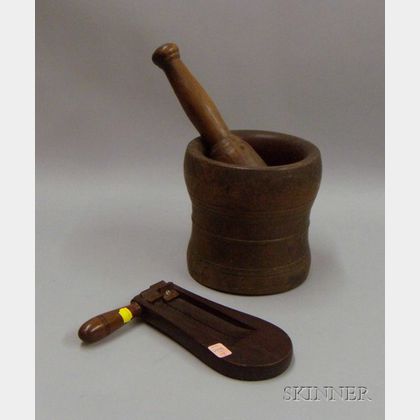 Wooden Ratchet Noisemaker and a Wooden Mortar and Pestle. 